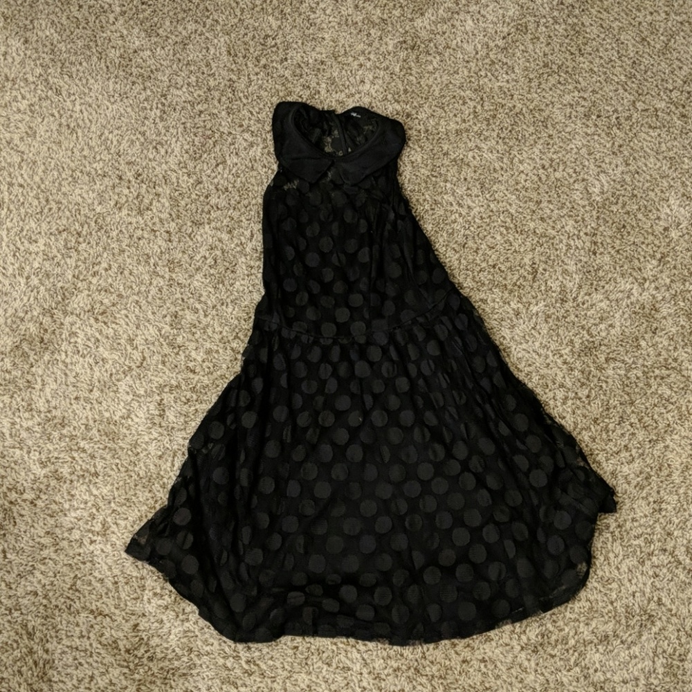 Black polka dot sleeveless dress